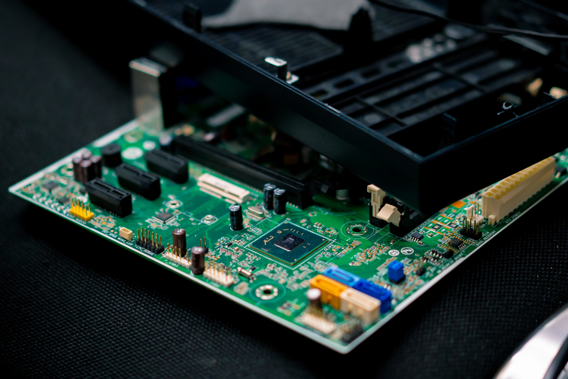 Tablet motherboard being repaired by Why Not Fix - Tablet repair in Ashford completed by specialists at Why Not Fix